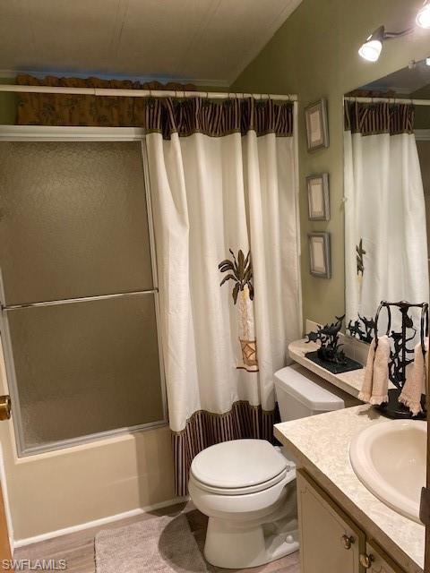 139 Rookery Road Naples, FL 34114 - Photo 26 of 37 a bathroom with a sink a toilet and a bathtub