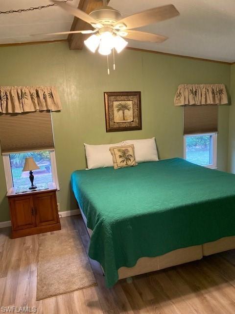 139 Rookery Road Naples, FL 34114 - Photo 27 of 37 a bedroom with a bed and a view of the wall