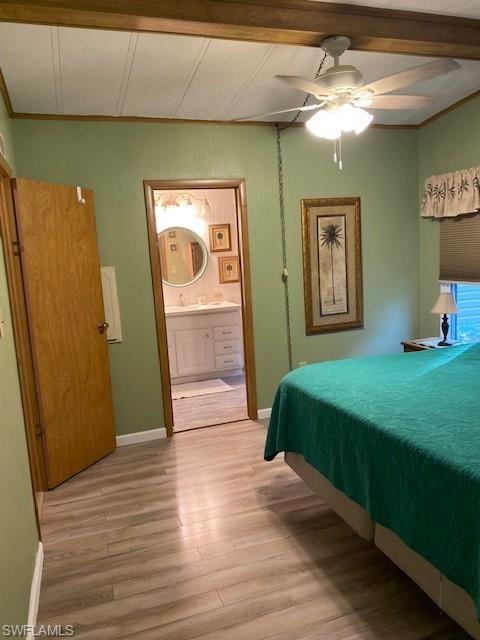 139 Rookery Road Naples, FL 34114 - Photo 28 of 37 a bedroom with a bed and a mirror