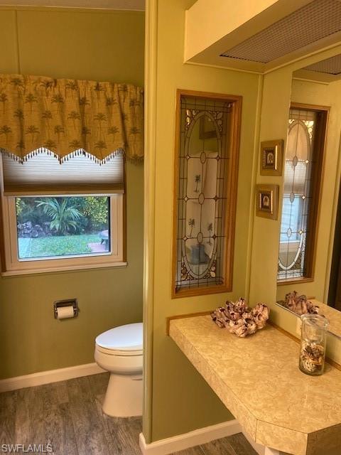 139 Rookery Road Naples, FL 34114 - Photo 32 of 37 a bathroom with a granite countertop sink and a mirror