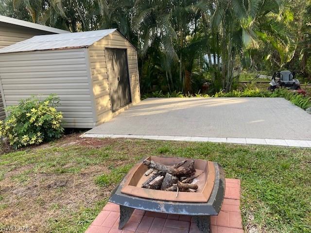 139 Rookery Road Naples, FL 34114 - Photo 33 of 37 a house view with a garden space