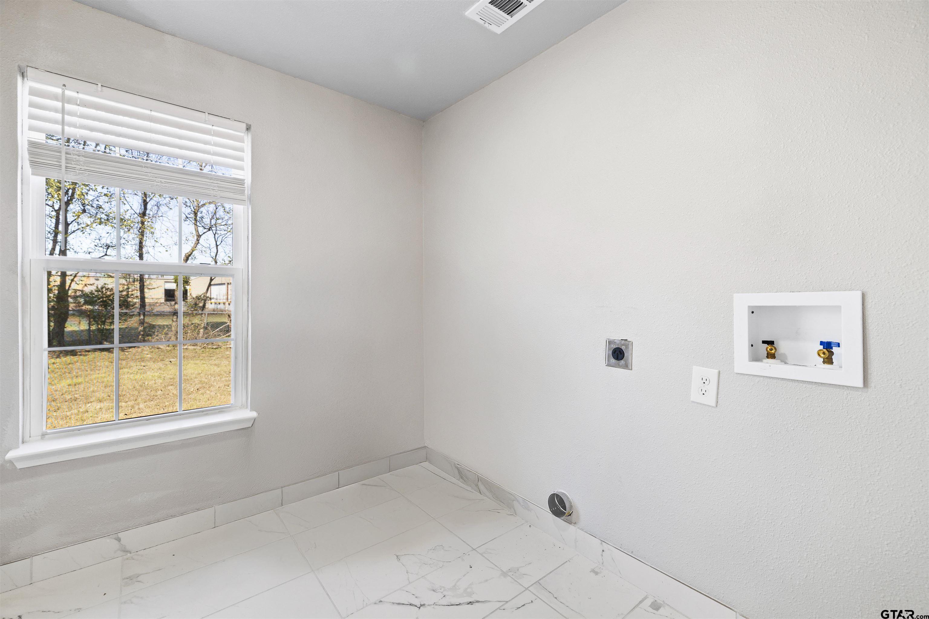 229 Orchard Street Alba, TX 75410 - Photo 16 of 16 a view of an empty room with a window