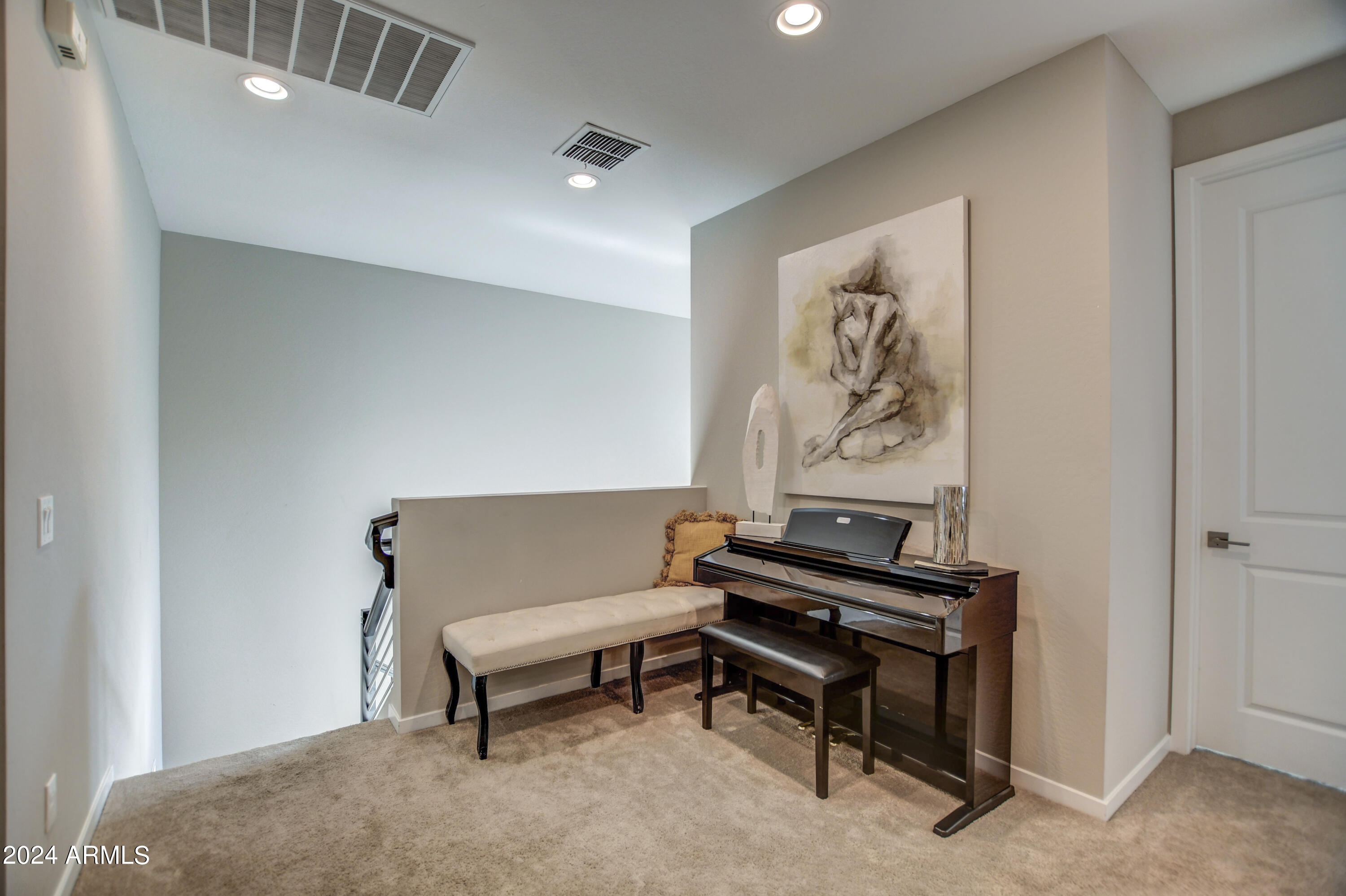 901 South Smith Road, Unit 1033 Tempe, AZ 85281 - Photo 23 of 43 a reading room with furniture and a wooden floor