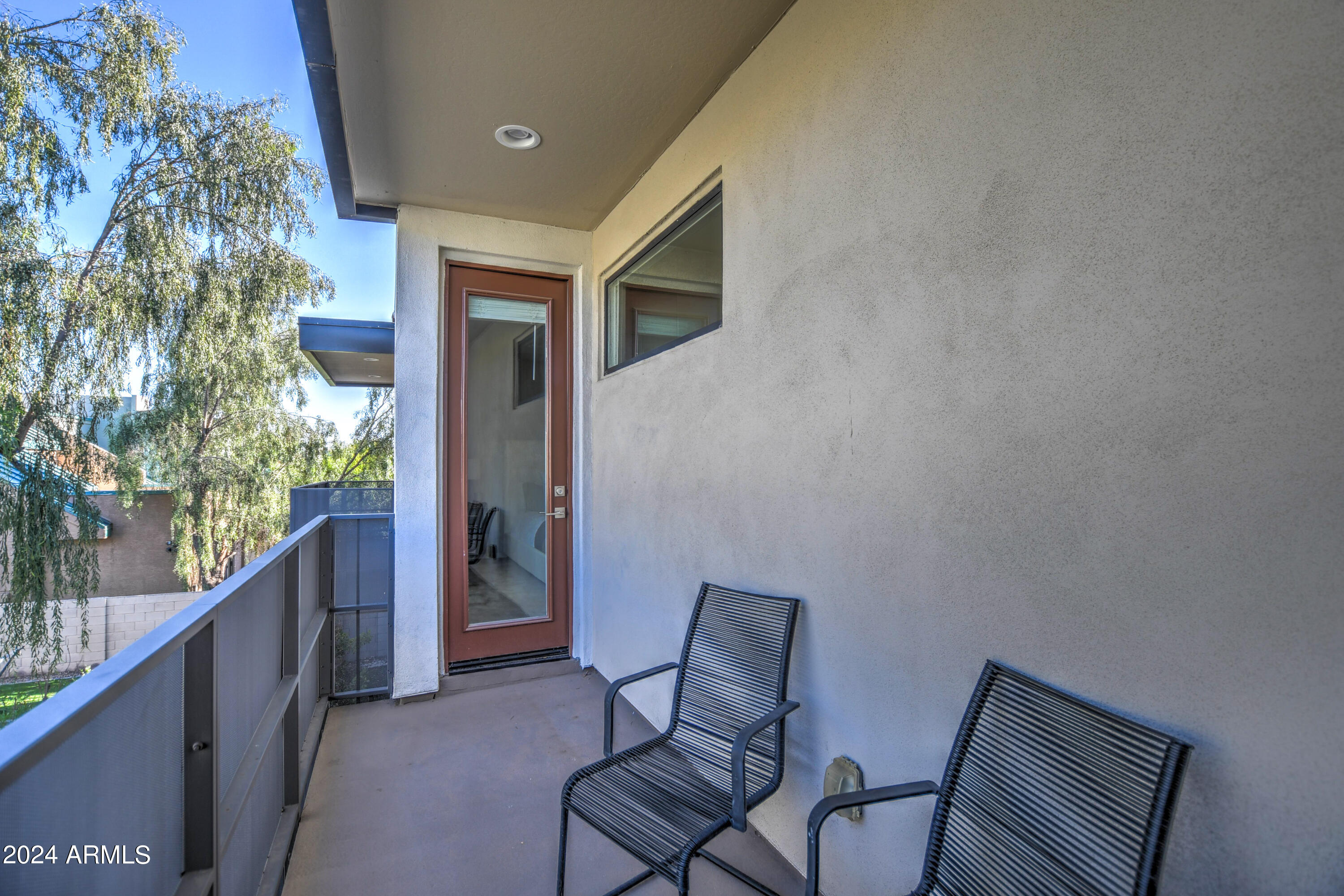 901 South Smith Road, Unit 1033 Tempe, AZ 85281 - Photo 28 of 43 a view of two chairs in the balcony