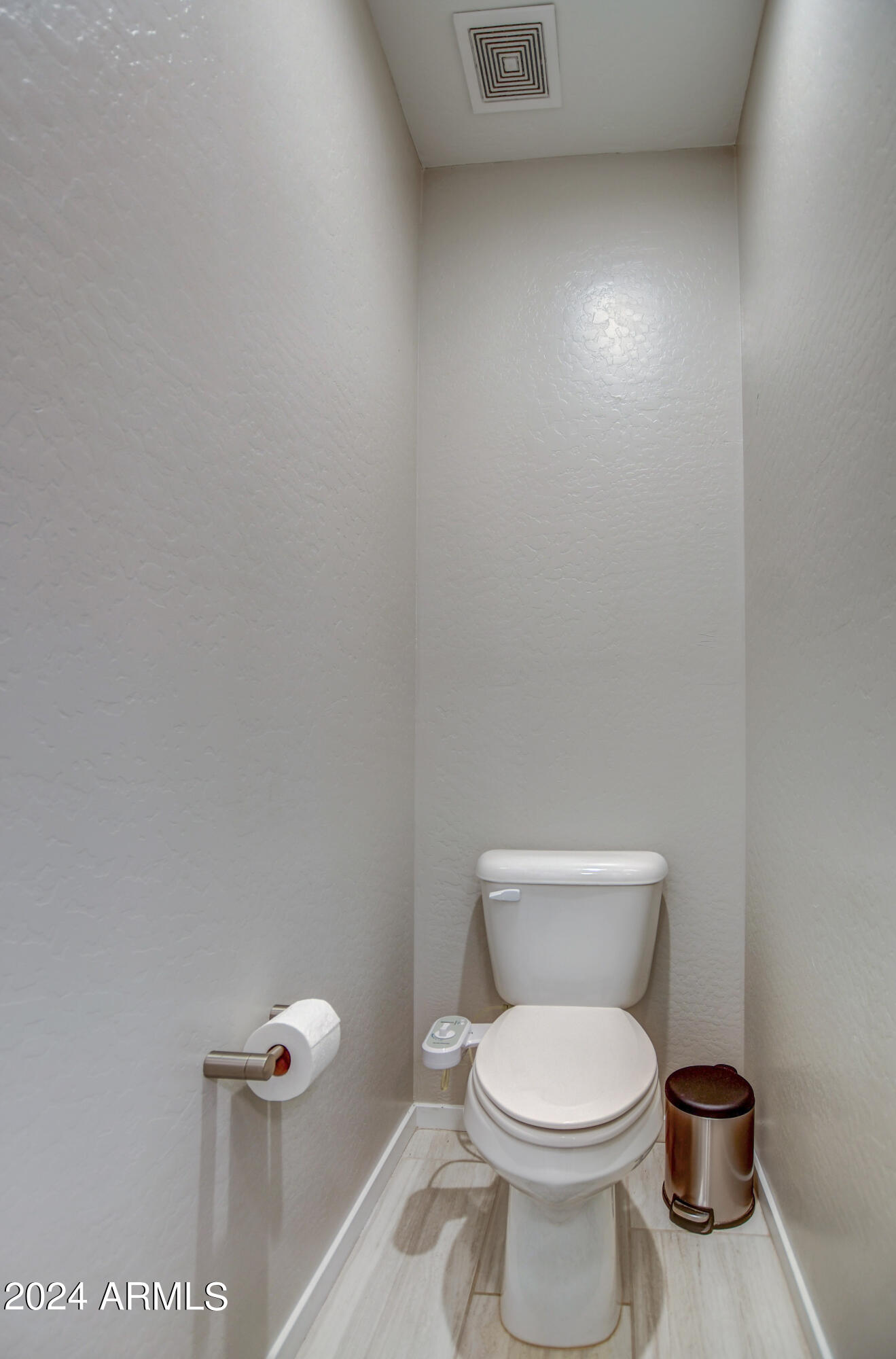 901 South Smith Road, Unit 1033 Tempe, AZ 85281 - Photo 32 of 43 a white toilet sitting next to a white wall