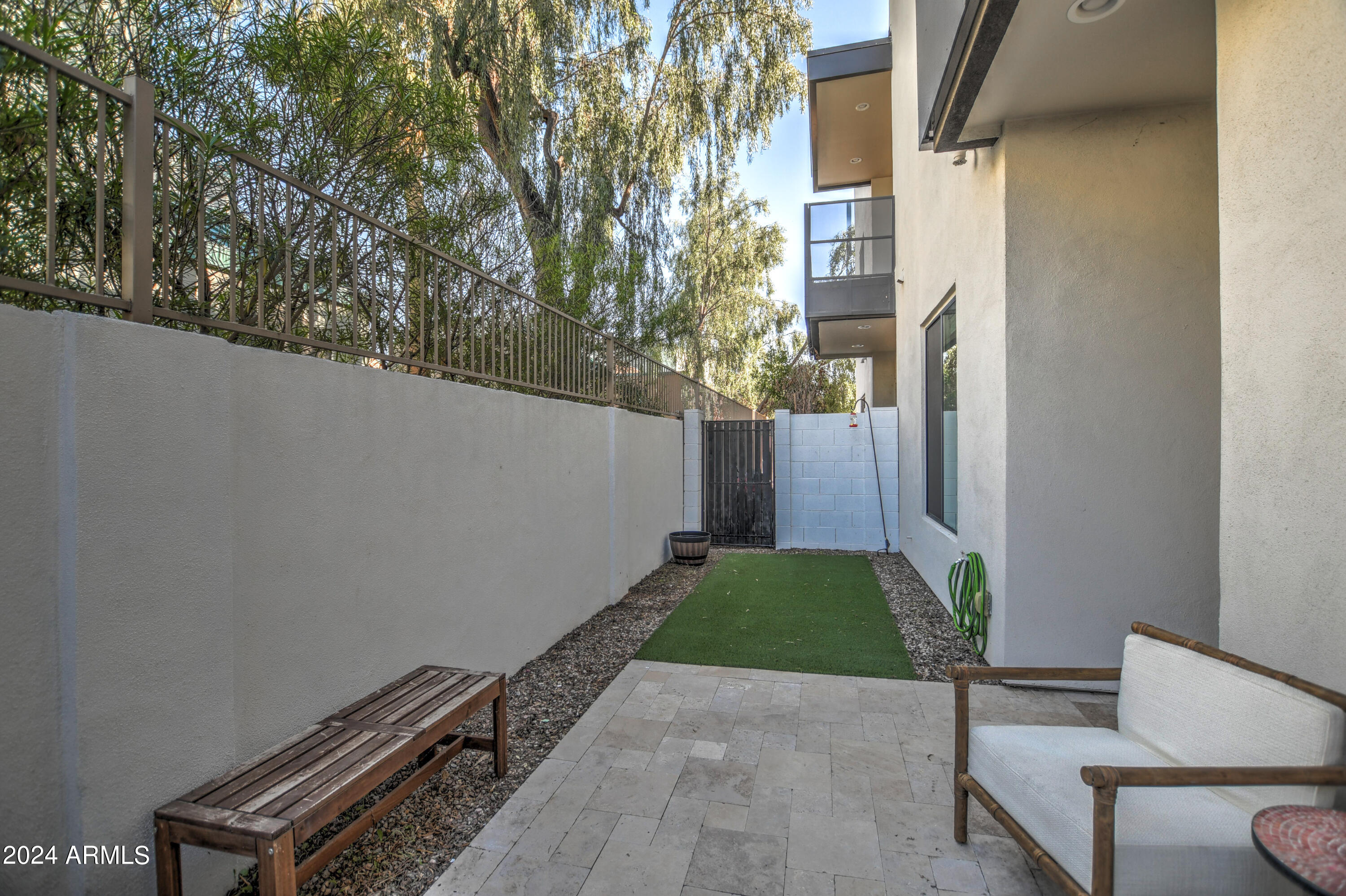 901 South Smith Road, Unit 1033 Tempe, AZ 85281 - Photo 37 of 43 a backyard of a house with outdoor seating