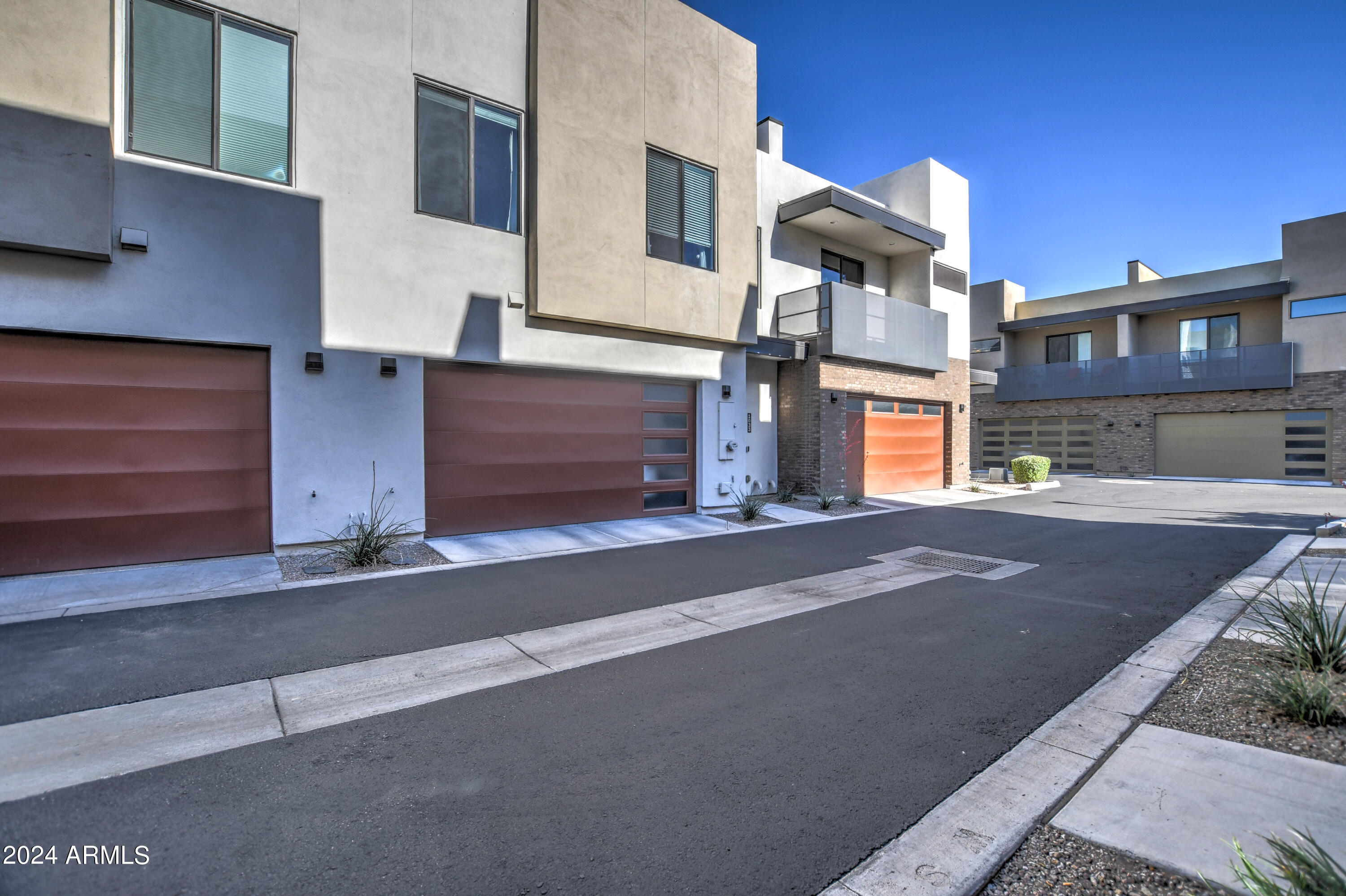 901 South Smith Road, Unit 1033 Tempe, AZ 85281 - Photo 41 of 43 a front view of a house with a yard