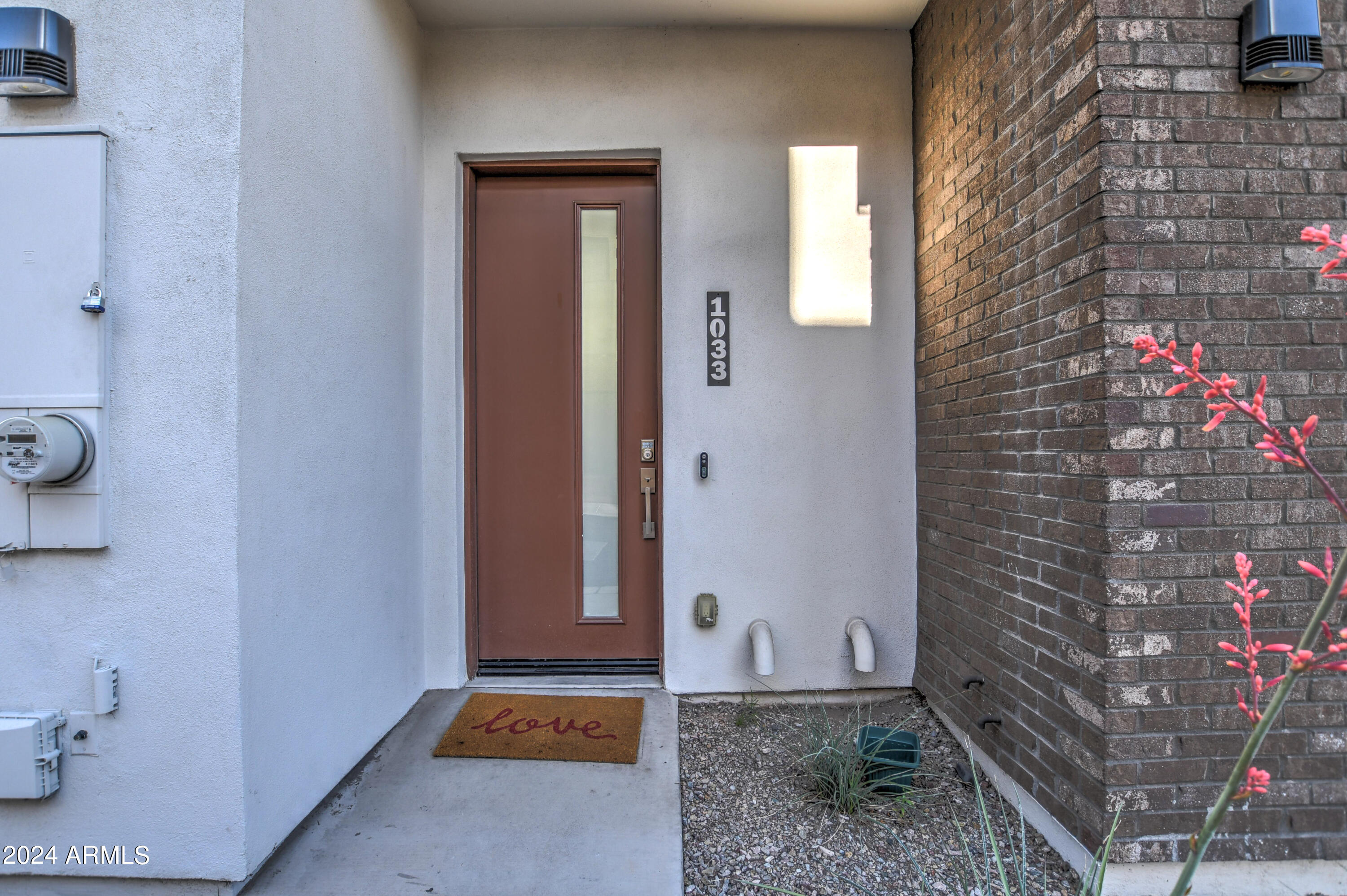 901 South Smith Road, Unit 1033 Tempe, AZ 85281 - Photo 5 of 43 a view of a door and chair