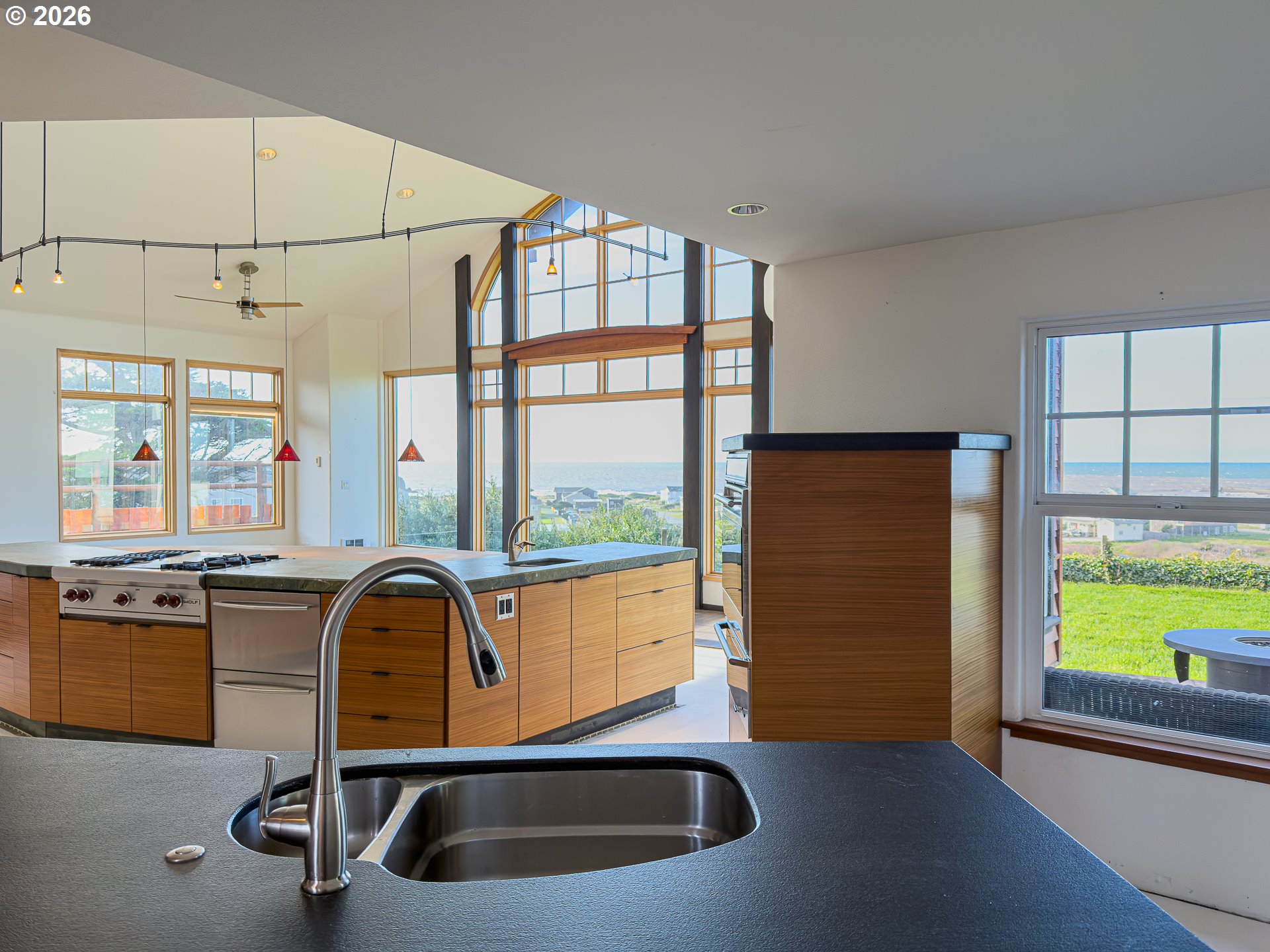 880 Ocean Drive Southwest Bandon, OR 97411 - Photo 19 of 48 a room with gym equipment and a large window