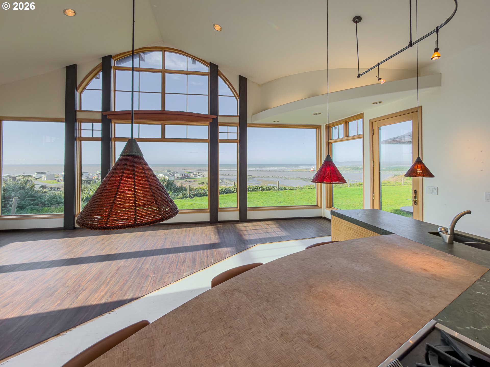 880 Ocean Drive Southwest Bandon, OR 97411 - Photo 20 of 48 a view of an entryway and hall with wooden floor