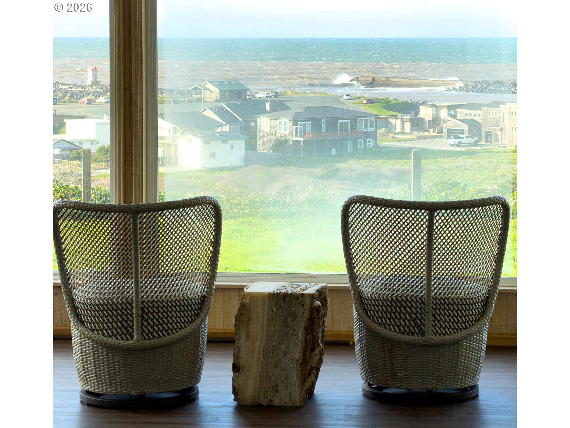 880 Ocean Drive Southwest Bandon, OR 97411 - Photo 22 of 48 a picture of floor has a glass window and a rug