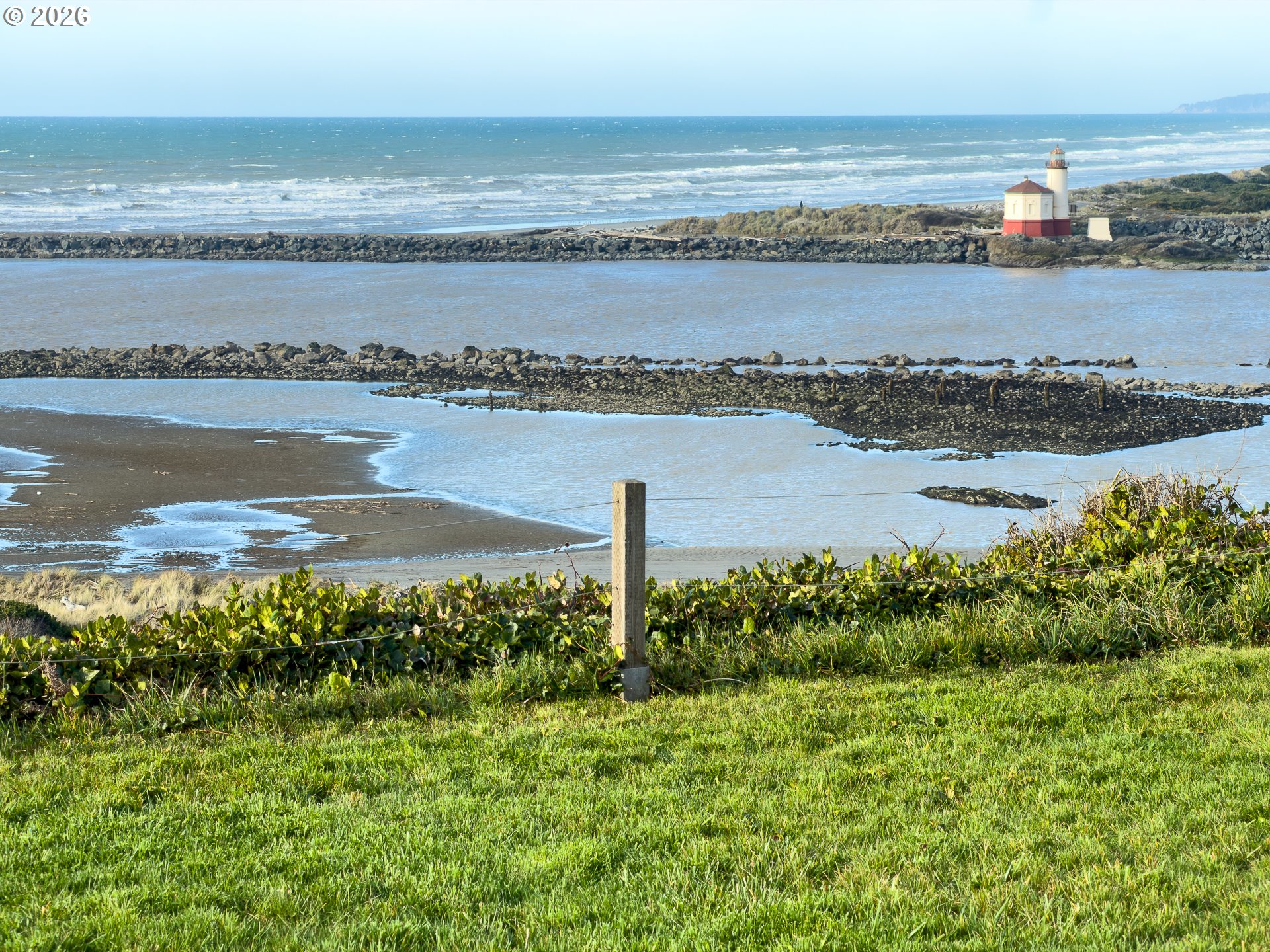 880 Ocean Drive Southwest Bandon, OR 97411 - Photo 23 of 48 a view of a city and ocean view