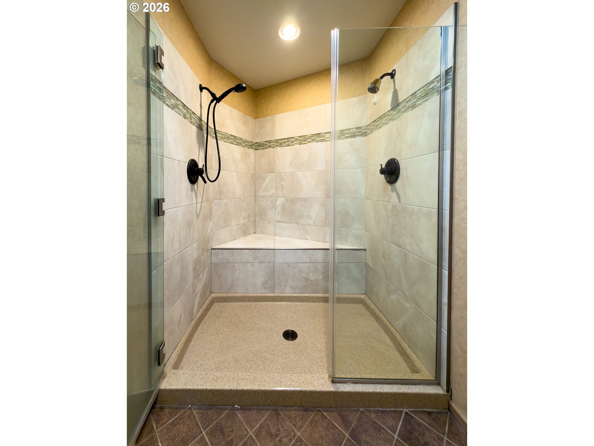 880 Ocean Drive Southwest Bandon, OR 97411 - Photo 29 of 48 a bathroom with a glass shower door