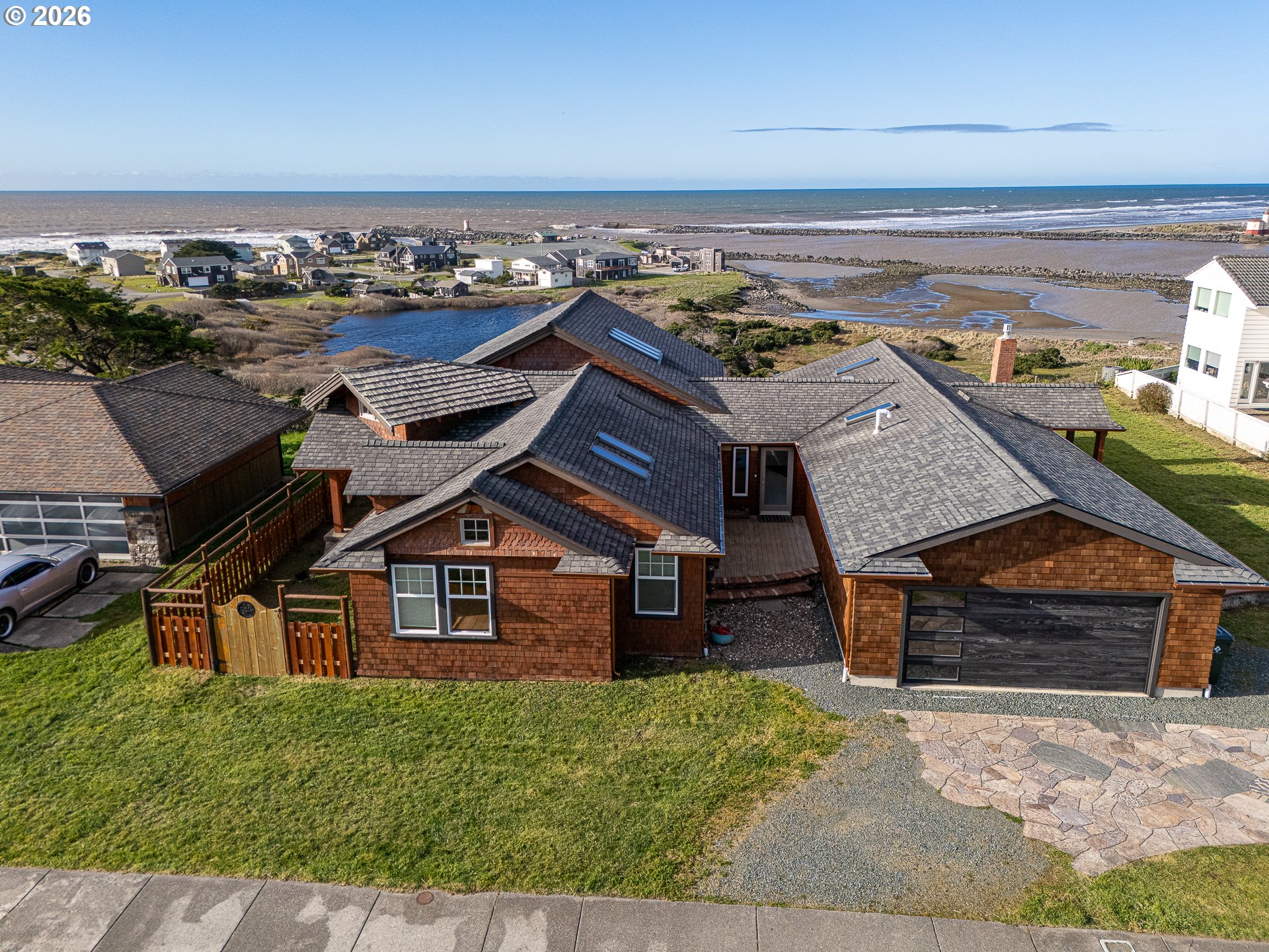 880 Ocean Drive Southwest Bandon, OR 97411 - Photo 45 of 48 an aerial view of a house
