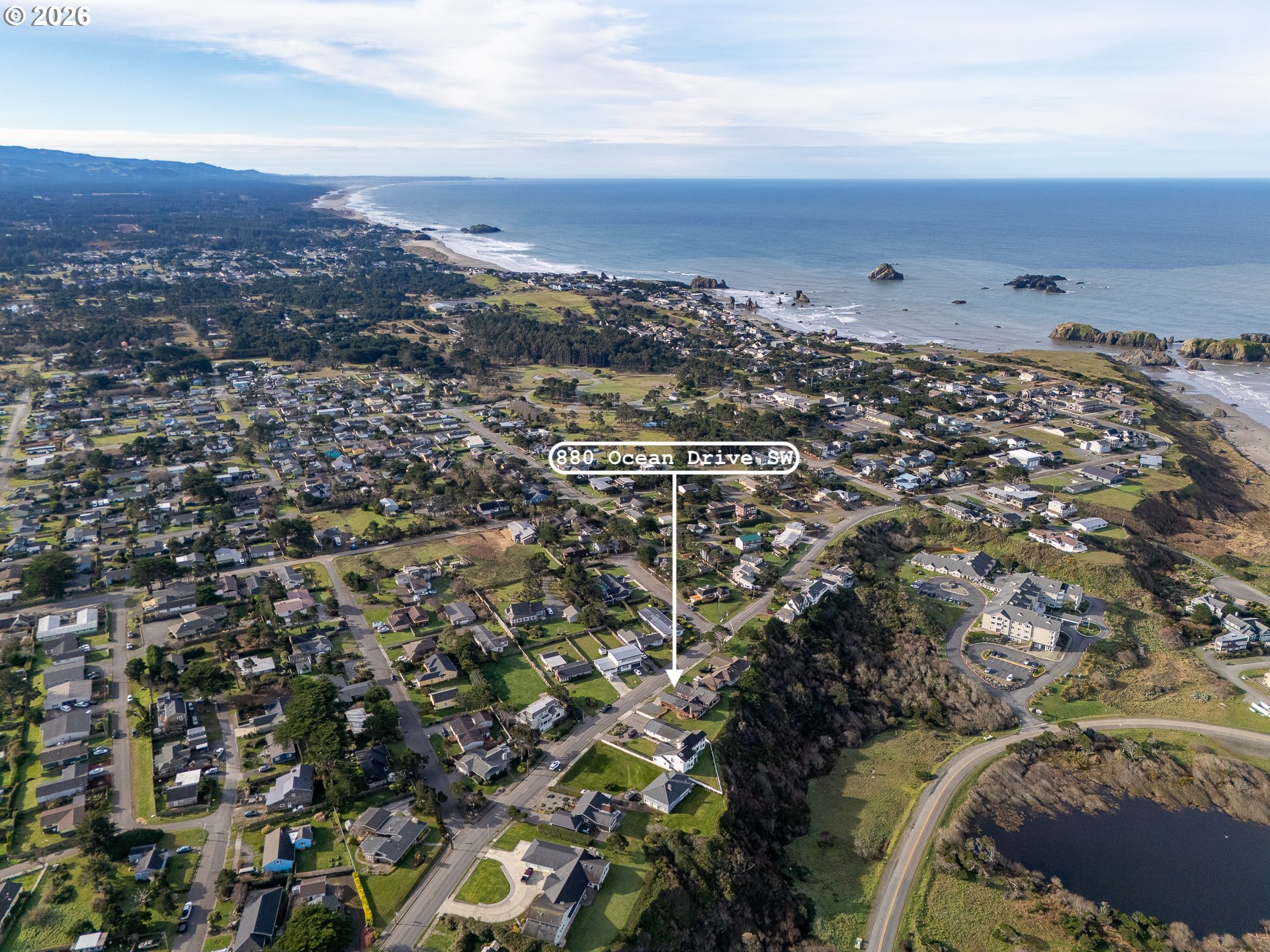 880 Ocean Drive Southwest Bandon, OR 97411 - Photo 5 of 48 an aerial view of multiple house