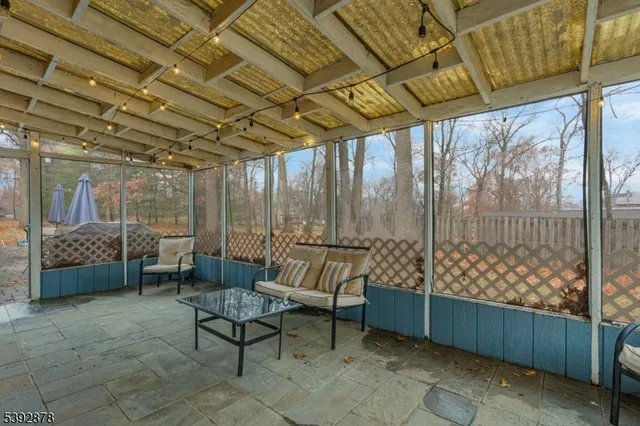 a outdoor living space with patio furniture and a potted plant