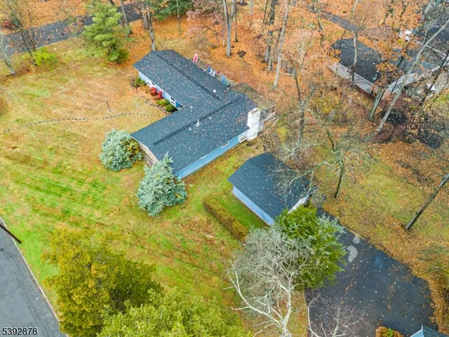 a view of a pathway with a yard