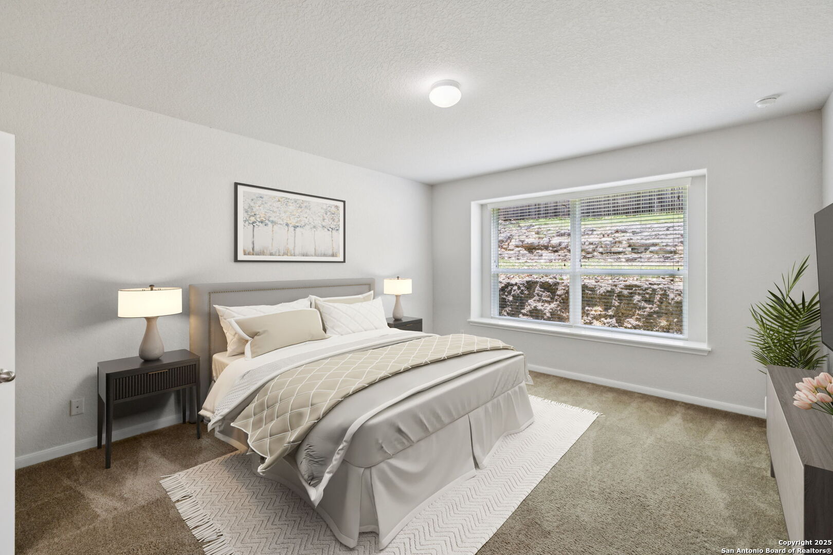 23567 7 Winds San Antonio, TX 78258 - Photo 11 of 49 a spacious bedroom with a large bed and a large window