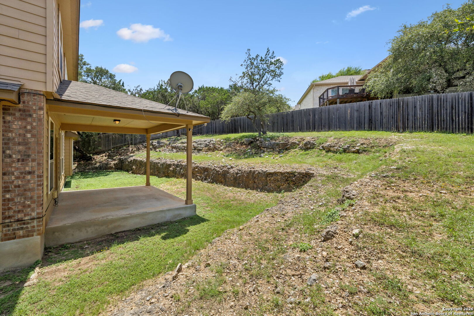 23567 7 Winds San Antonio, TX 78258 - Photo 44 of 49 a view of a porch with furniture and garden