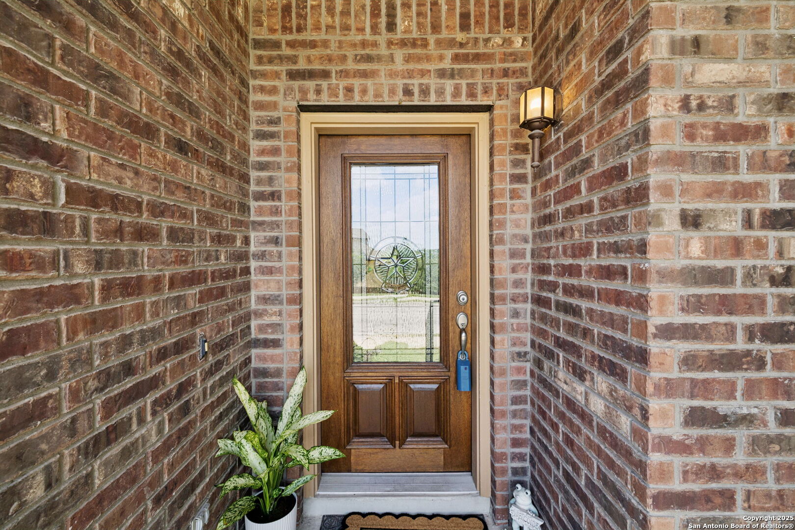 23567 7 Winds San Antonio, TX 78258 - Photo 5 of 49 a front view of a house with a garden