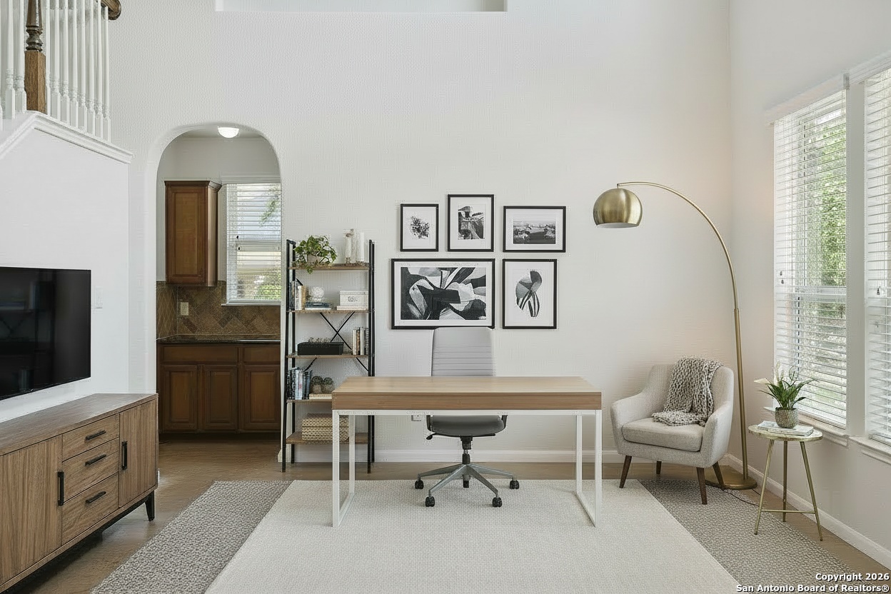 23567 7 Winds San Antonio, TX 78258 - Photo 7 of 49 a living room with furniture and a flat screen tv