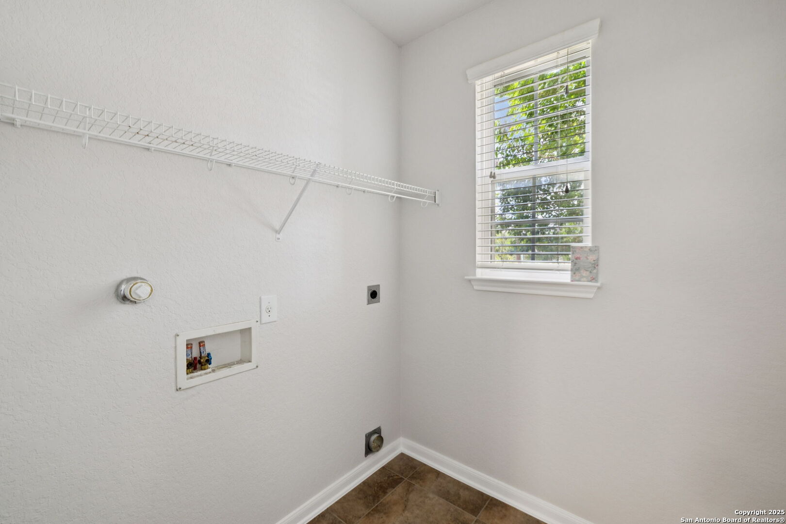 23567 7 Winds San Antonio, TX 78258 - Photo 8 of 49 a view of room with hardwood floor and window