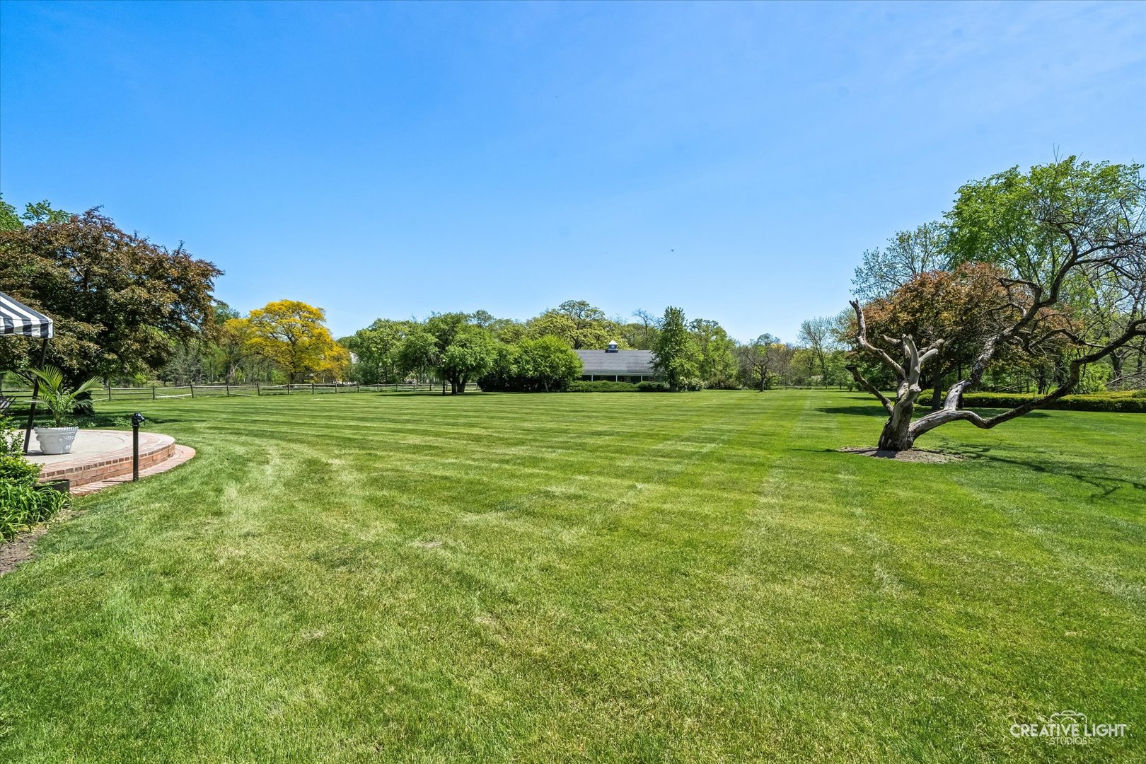 33W451 Surrey Road Wayne, IL 60184 - Photo 11 of 41 a view of a garden with a lake
