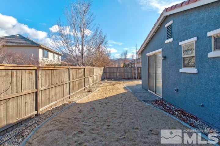 475 Dartmoor Court Reno, NV 89521 - Photo 34 of 35 a view of a backyard of the house