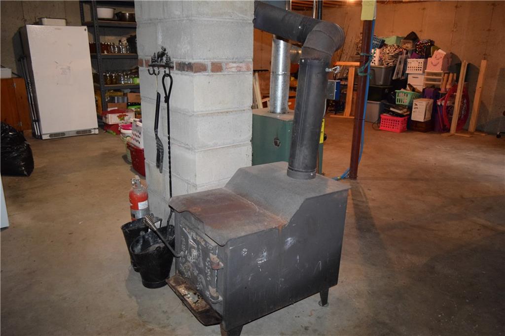 643 Dead River Road Bowdoin, ME 04287 - Photo 20 of 32 Woos stove in basement.