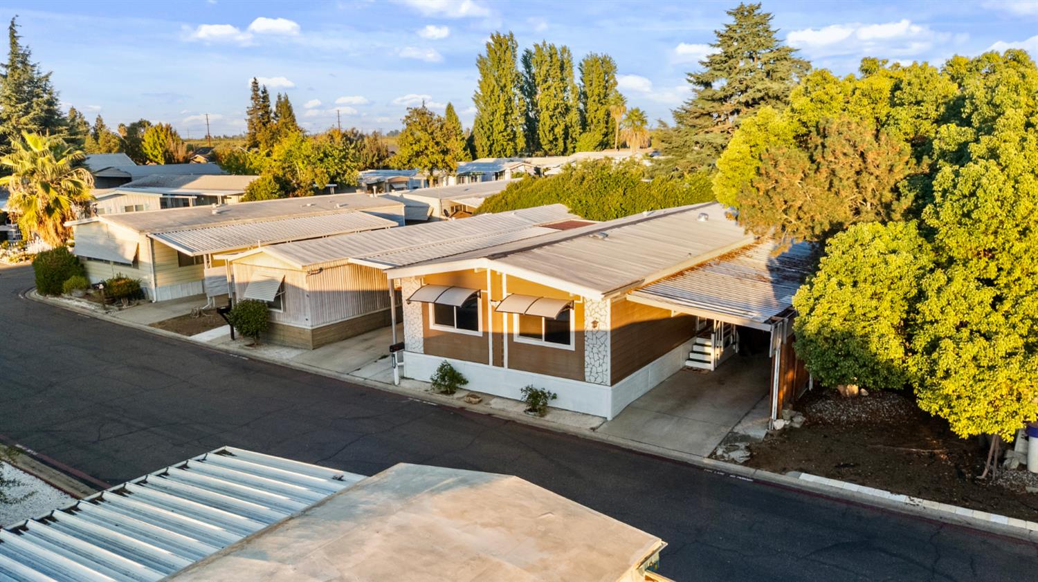 4837 Faith Home Road, Unit 162 Ceres, CA 95307 - Photo 34 of 45 a view of a house with a yard