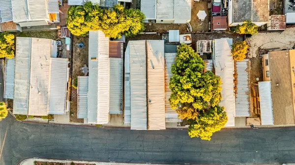 an aerial view of residential building and ocean