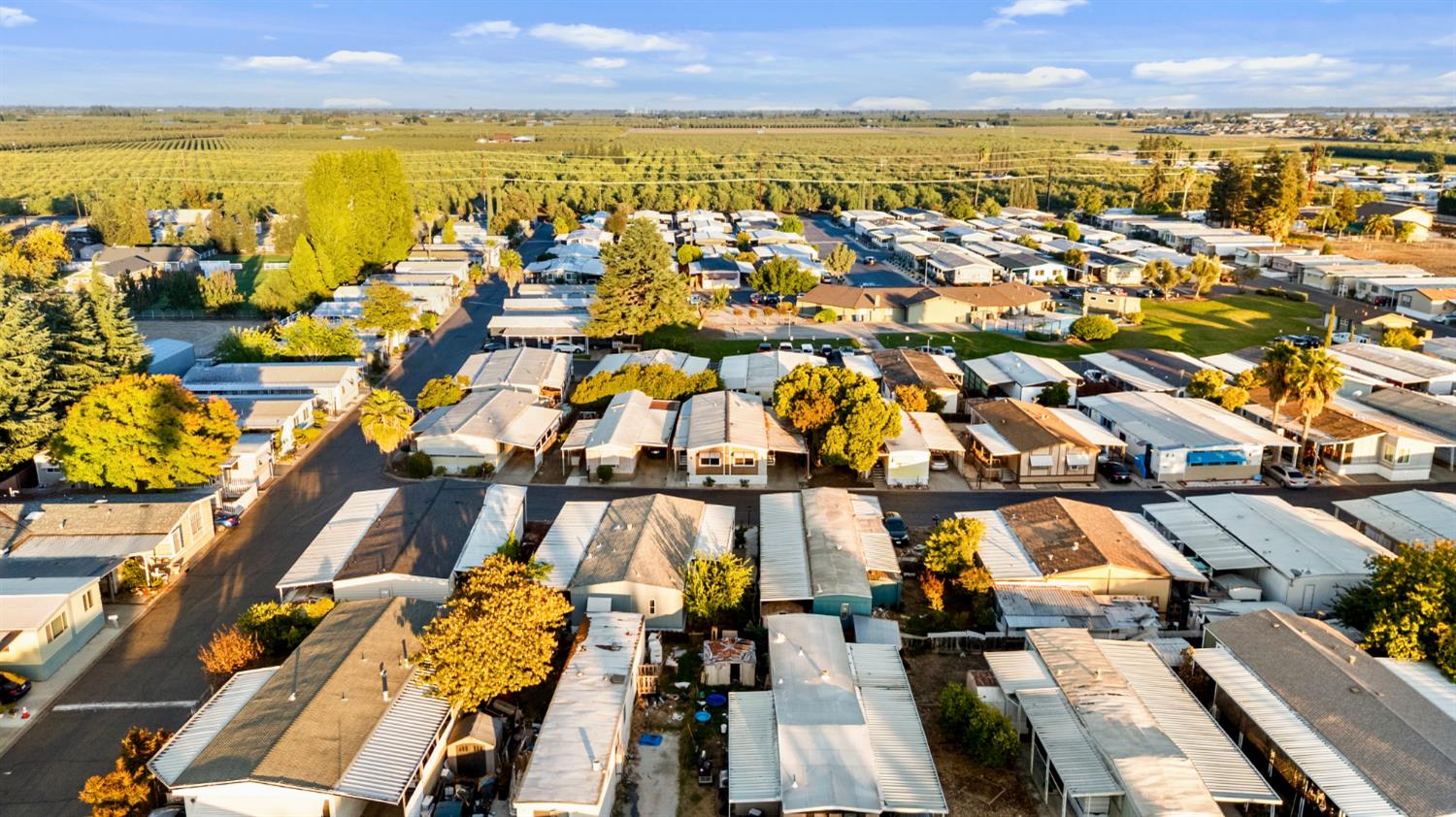 4837 Faith Home Road, Unit 162 Ceres, CA 95307 - Photo 42 of 45 an aerial view of residential building and lake