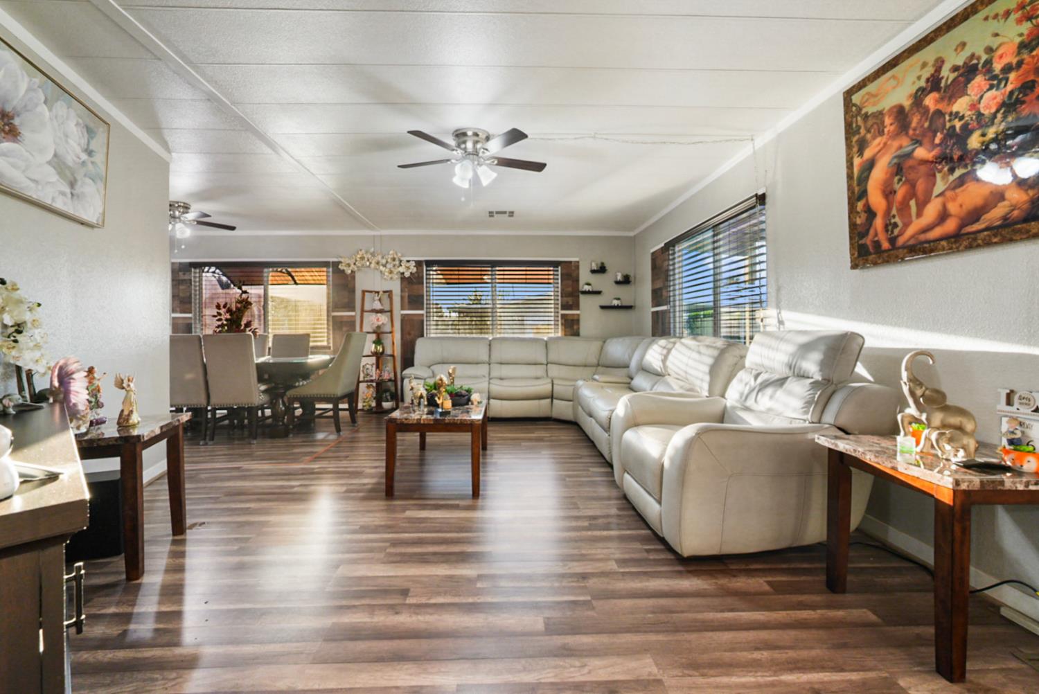 4837 Faith Home Road, Unit 162 Ceres, CA 95307 - Photo 6 of 45 a living room with furniture and wooden floor