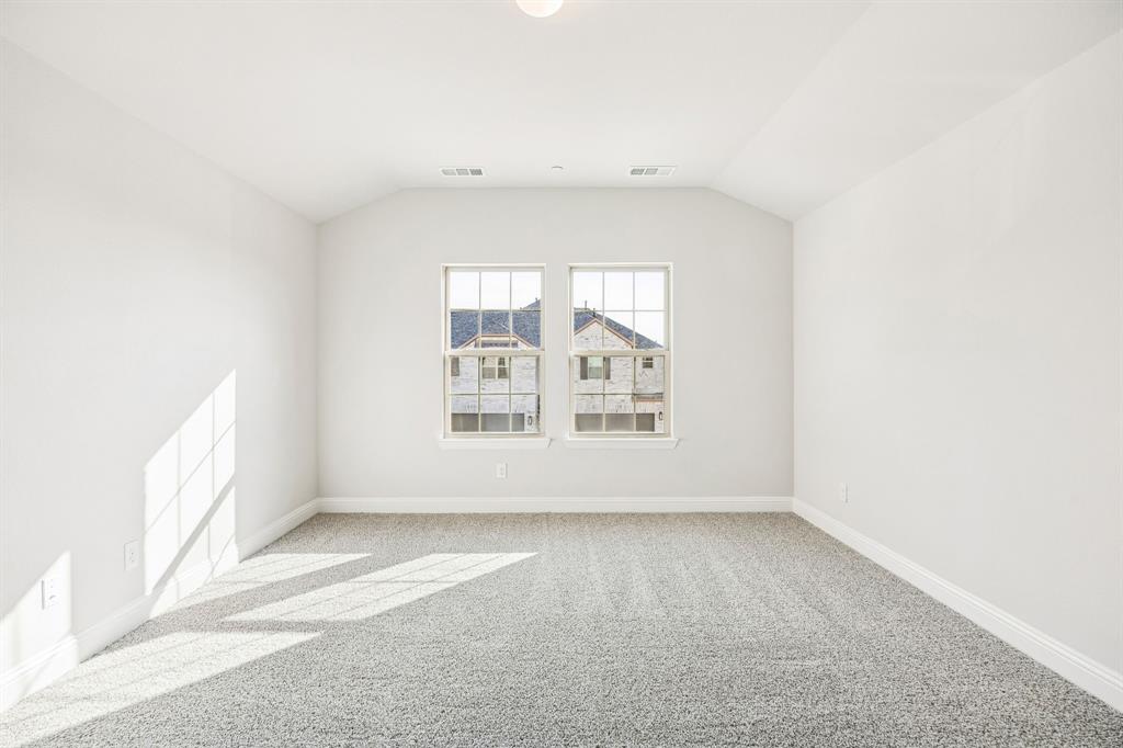 912 Heart Reef Road Plano, TX 75075 - Photo 9 of 20 an empty room with a window