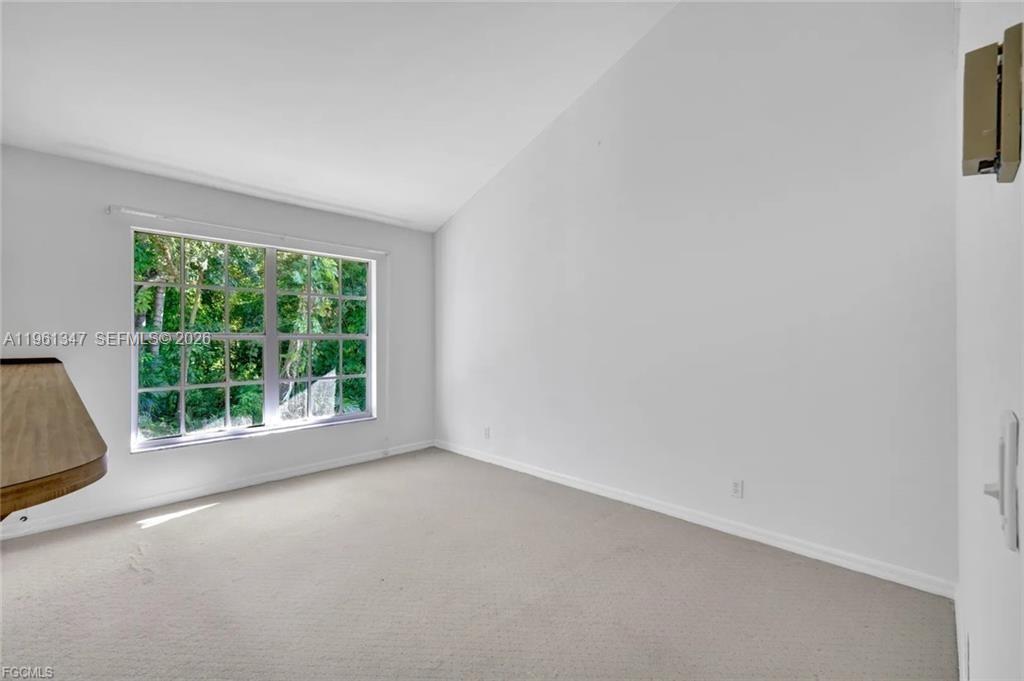 1345 Barrett Road North Fort Myers, FL 33903 - Photo 11 of 27 an empty room with a window