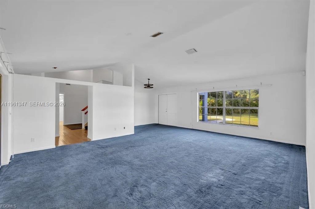 1345 Barrett Road North Fort Myers, FL 33903 - Photo 17 of 27 a view of empty room with a fireplace
