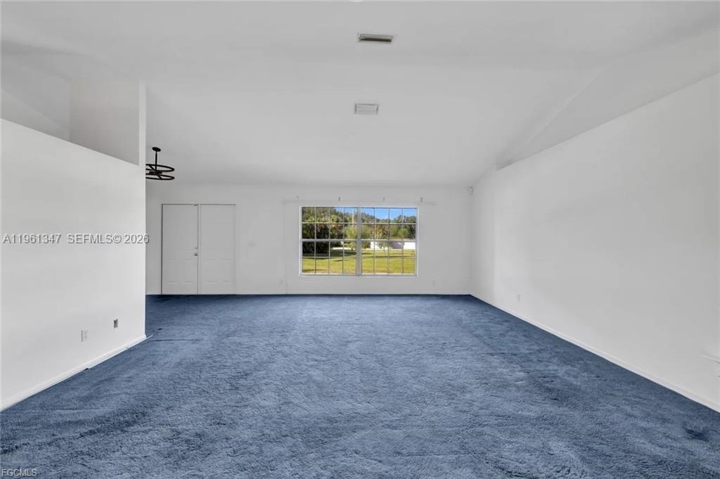 1345 Barrett Road North Fort Myers, FL 33903 - Photo 18 of 27 an empty room with windows