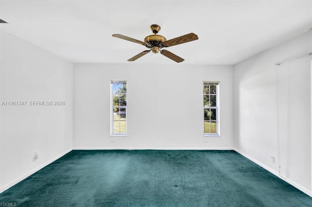 1345 Barrett Road North Fort Myers, FL 33903 - Photo 19 of 27 a view of empty room with windows
