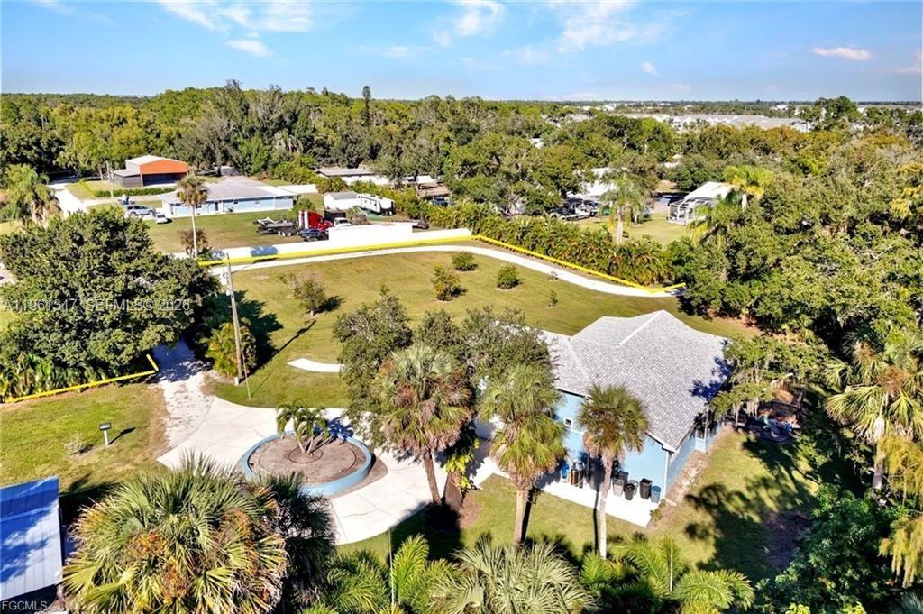 1345 Barrett Road North Fort Myers, FL 33903 - Photo 5 of 27 an aerial view of residential houses with outdoor space