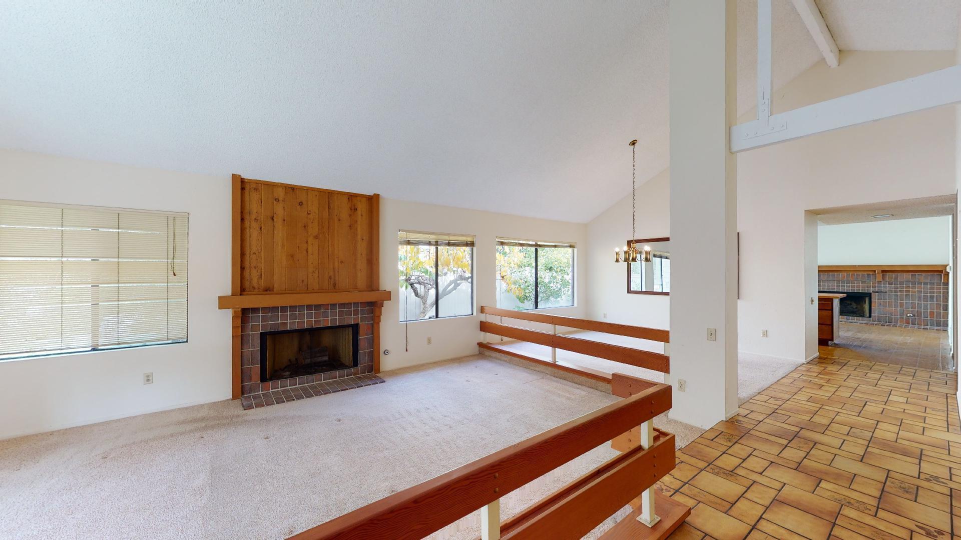 8 Elderberry Irvine, CA 92603 - Photo 12 of 59 a view of livingroom with furniture and a fireplace