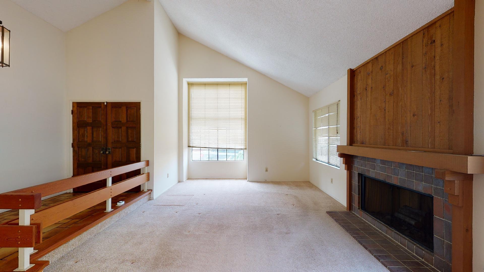 8 Elderberry Irvine, CA 92603 - Photo 17 of 59 a room with furniture and a fireplace