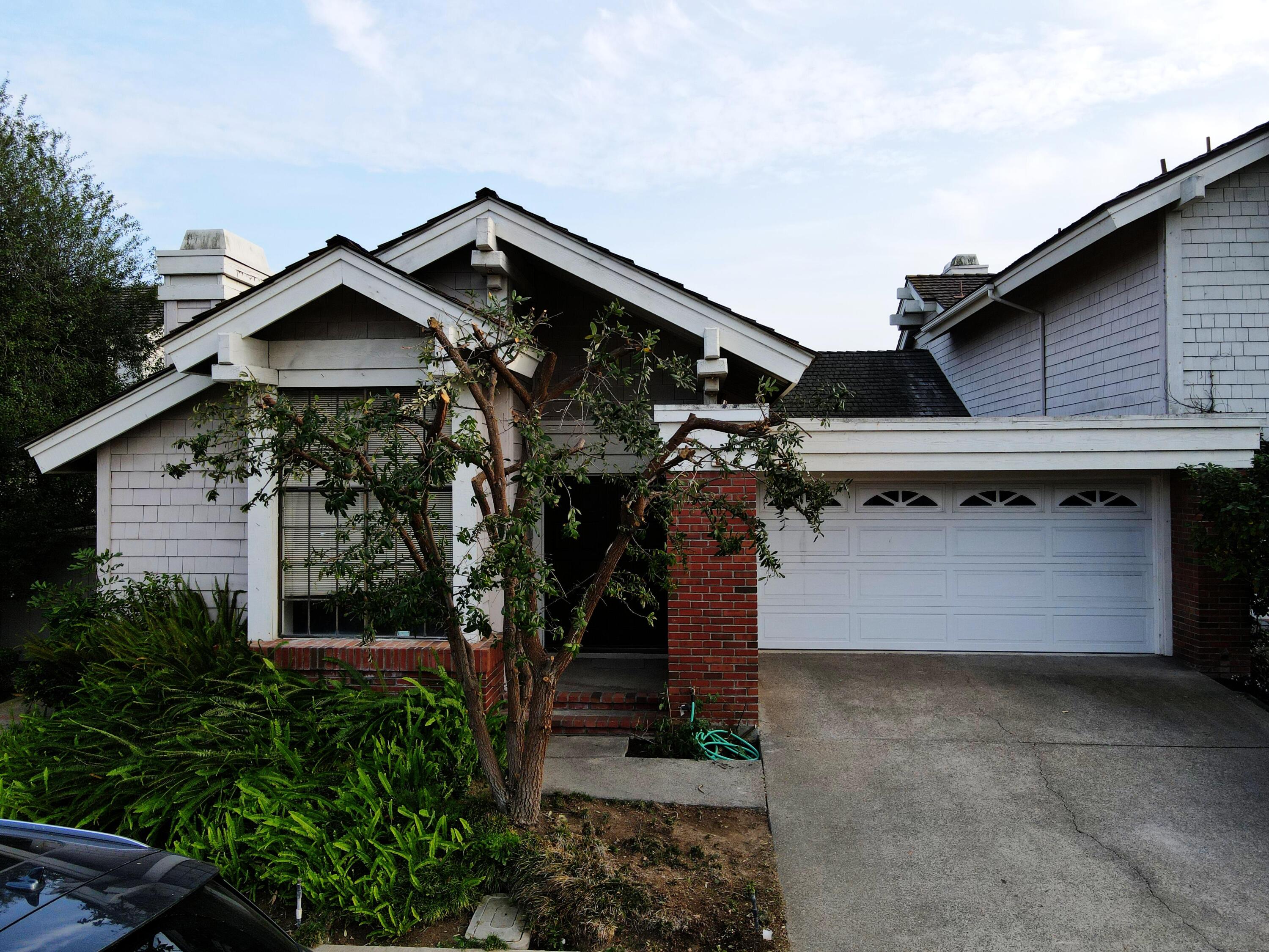 8 Elderberry Irvine, CA 92603 - Photo 2 of 59 a view of a house with a garage