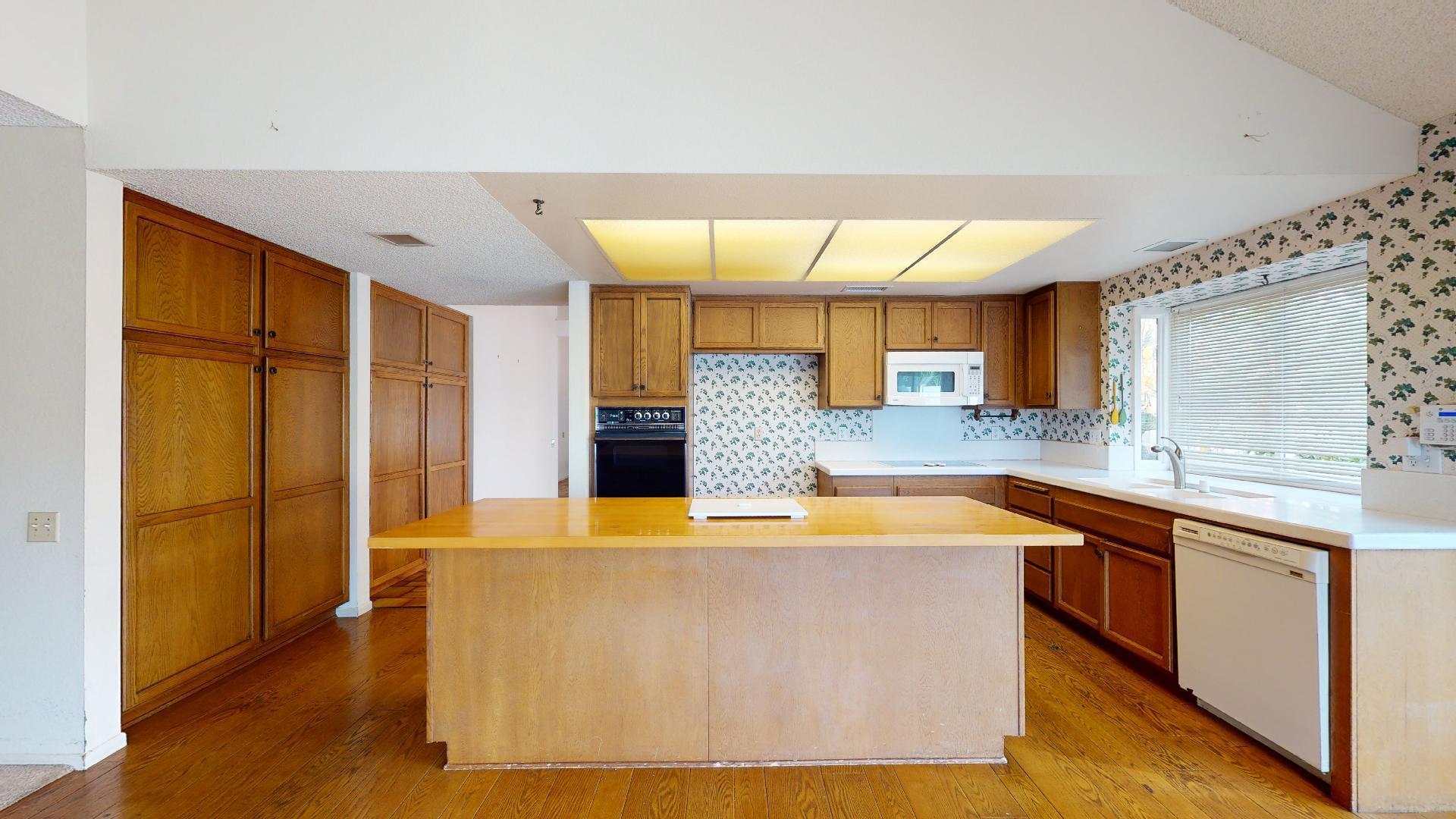 8 Elderberry Irvine, CA 92603 - Photo 27 of 59 a kitchen with stainless steel appliances granite countertop a sink and a refrigerator