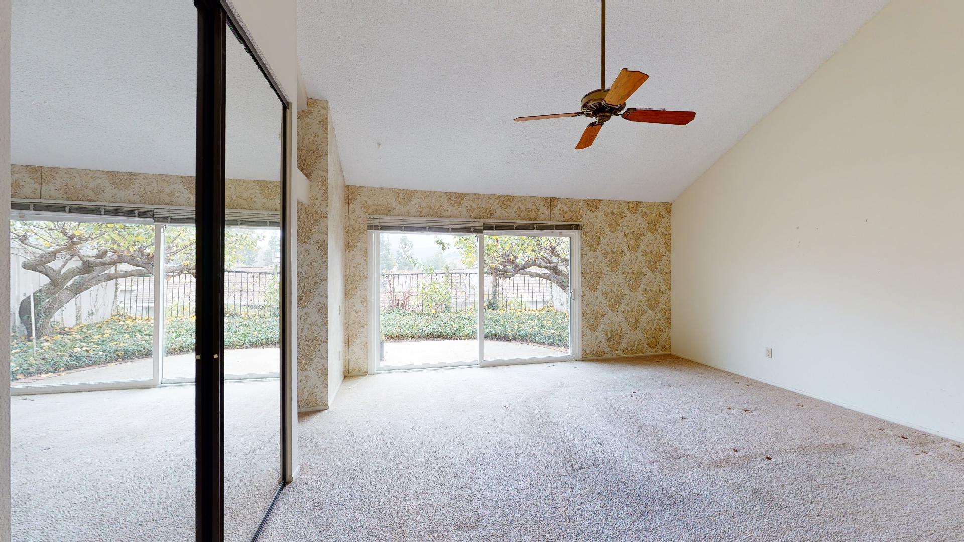 8 Elderberry Irvine, CA 92603 - Photo 42 of 59 a view of a livingroom with a ceiling fan and window