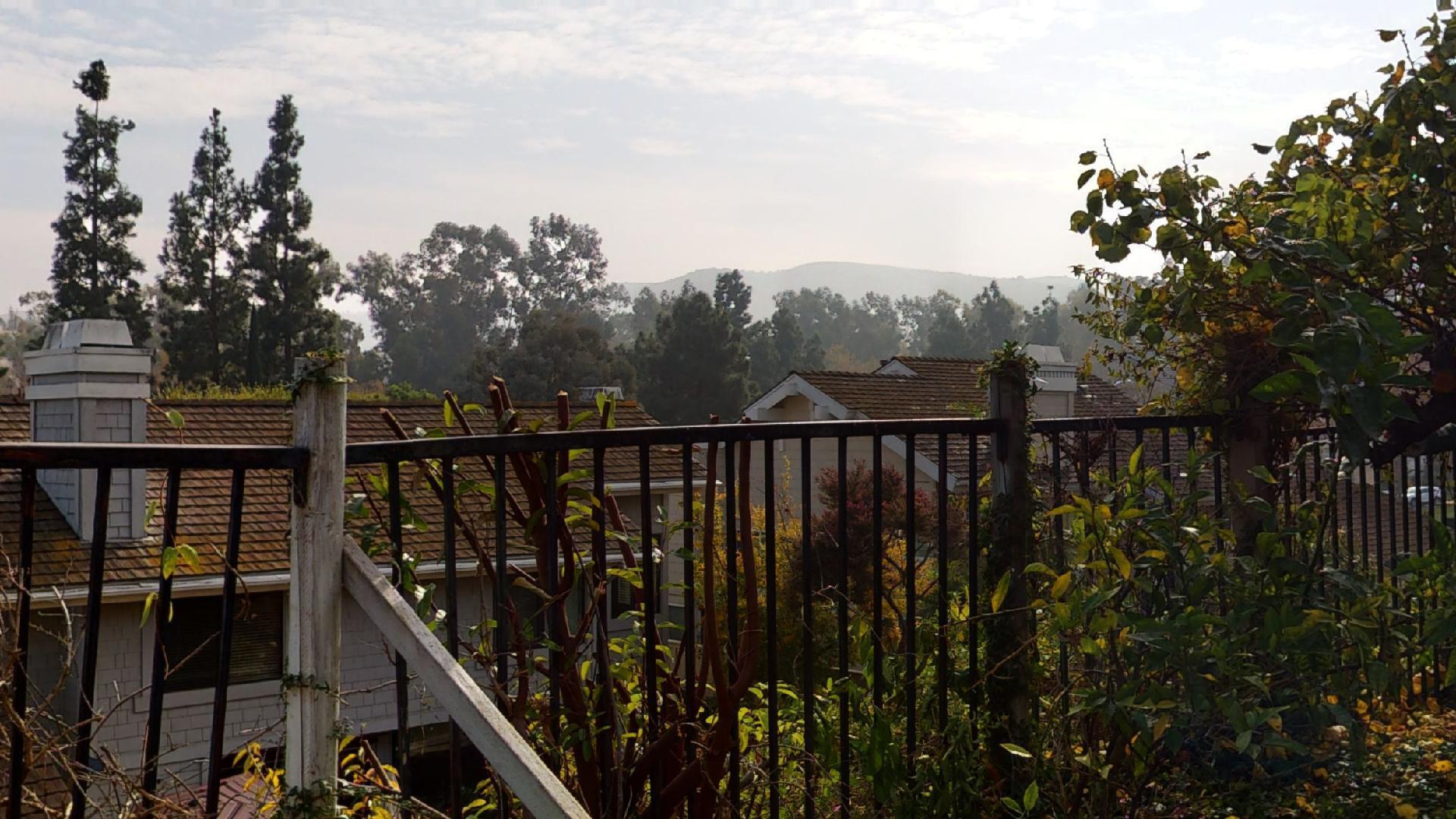 8 Elderberry Irvine, CA 92603 - Photo 59 of 59 a view of a balcony with wooden fence and floor