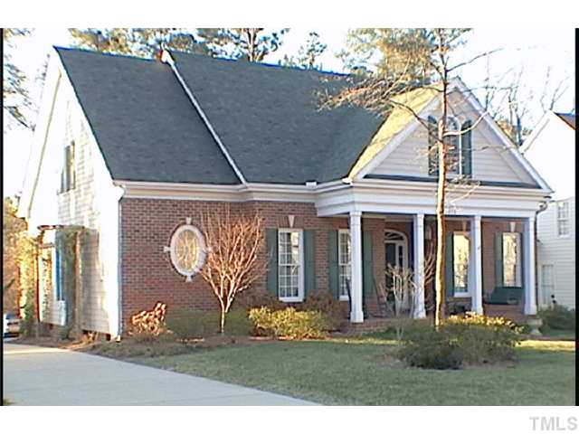 3316 Tall Tree Place Raleigh, NC 27607 - Photo 23 of 23 a front view of a house with garden