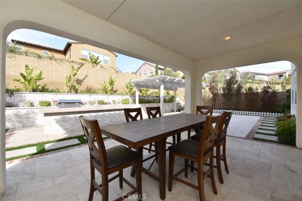 107 Fairgrove Irvine, CA 92618 - Photo 20 of 31 a view of a dining room with furniture and window