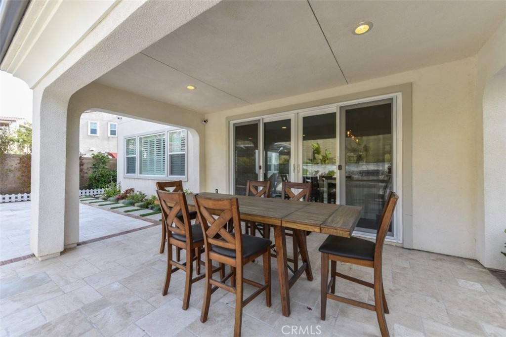 107 Fairgrove Irvine, CA 92618 - Photo 25 of 31 a dining room with furniture and window