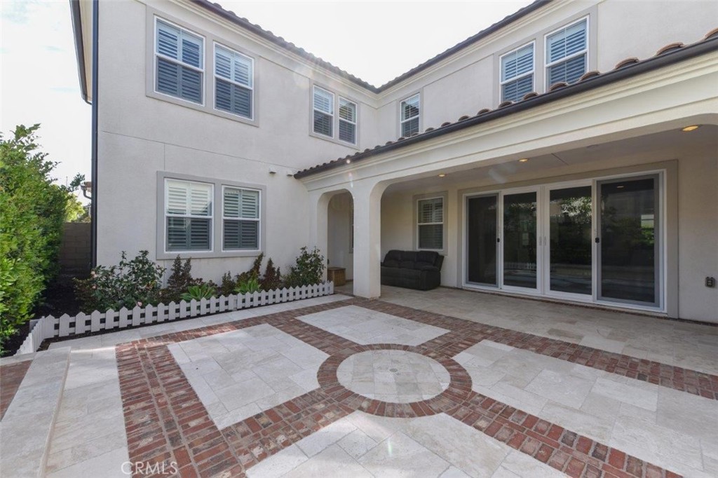 107 Fairgrove Irvine, CA 92618 - Photo 31 of 31 a view of a house with patio