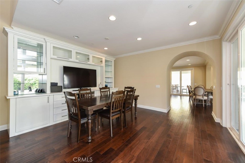 107 Fairgrove Irvine, CA 92618 - Photo 6 of 31 a view of a dining room with furniture window and wooden floor